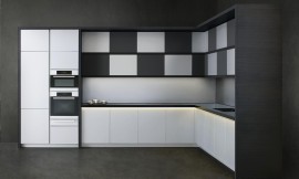 Lujo en estado puro: Este modelo de cocina es el resultado del trabajo con el diseñador Armani. El centro de atención de esta cocina son los armarios altos que simulan un tablero de ajedrez y le dan el carácter exclusivo a esta cocina. Zuordnung: Stil Cocinas de lujo, Planungsart Cocinas en L