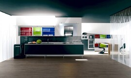 Extravagante mezcla de elementos: Con costados y encimera extra planos, armarios altos de cristal con fondos de colores y con patas en vez de zócalo Zuordnung: Stil Cocinas modernas, Planungsart Cocinas con isla