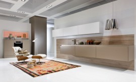 Líneas sencillas y muebles colgantes que dan ligereza al conjunto. La cocina Warendorf en tonos tierras se adapta a la sala de estar, convirtiéndose en un accesorio más. Todo ello sin renunciar a una calidad y una funcionalidad de primerísima calidad, que hacen posible satisfacer los deseos de bienestar de los más exigentes. Zuordnung: Stil Cocinas de diseño, Planungsart Cocinas americanas (abiertas)